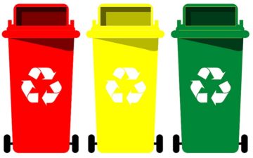 the collection of different color recycle bins